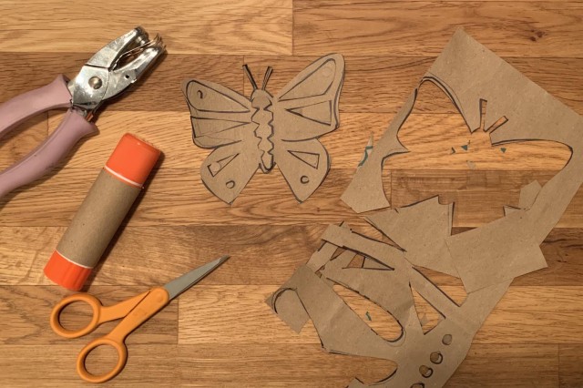 Cut out butterfly shapes from the heavyweight paper