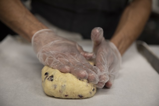 shaping ball of dough 