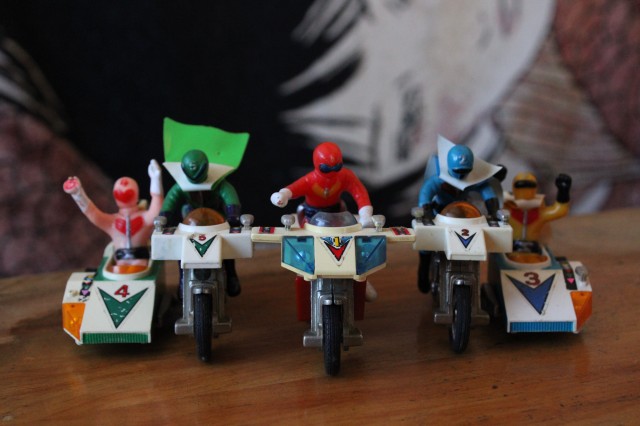 5 action figues on motorcycles