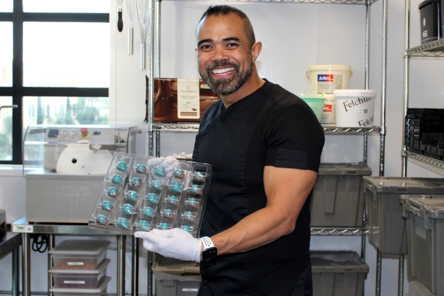 Albert Daniel poses with chocolate