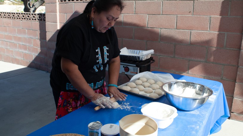 Woman making Dough at Table 
